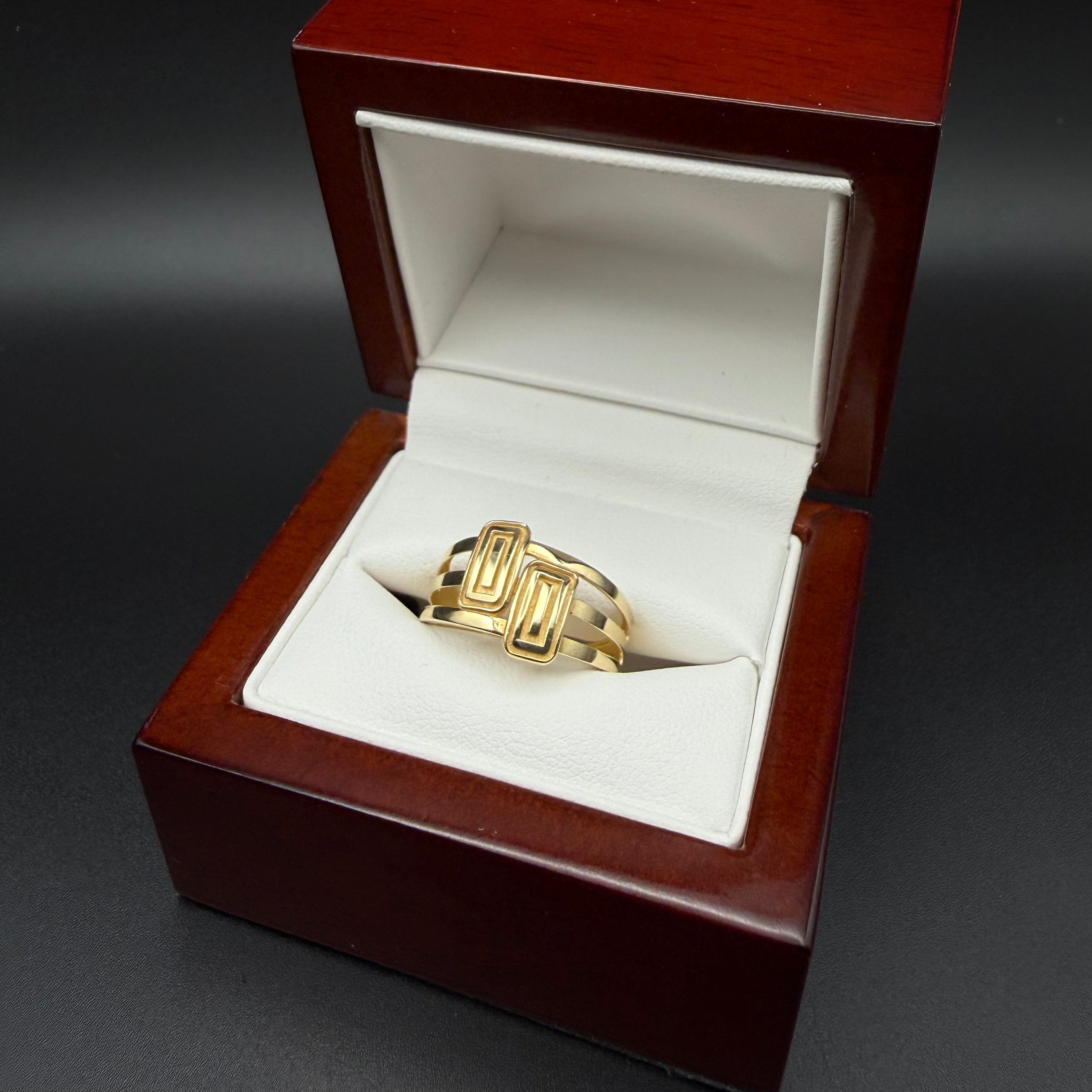 Anillo de doble escudo